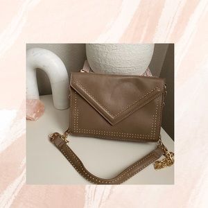 Steve Madden crossbody. Taupe with gold detail gently used.